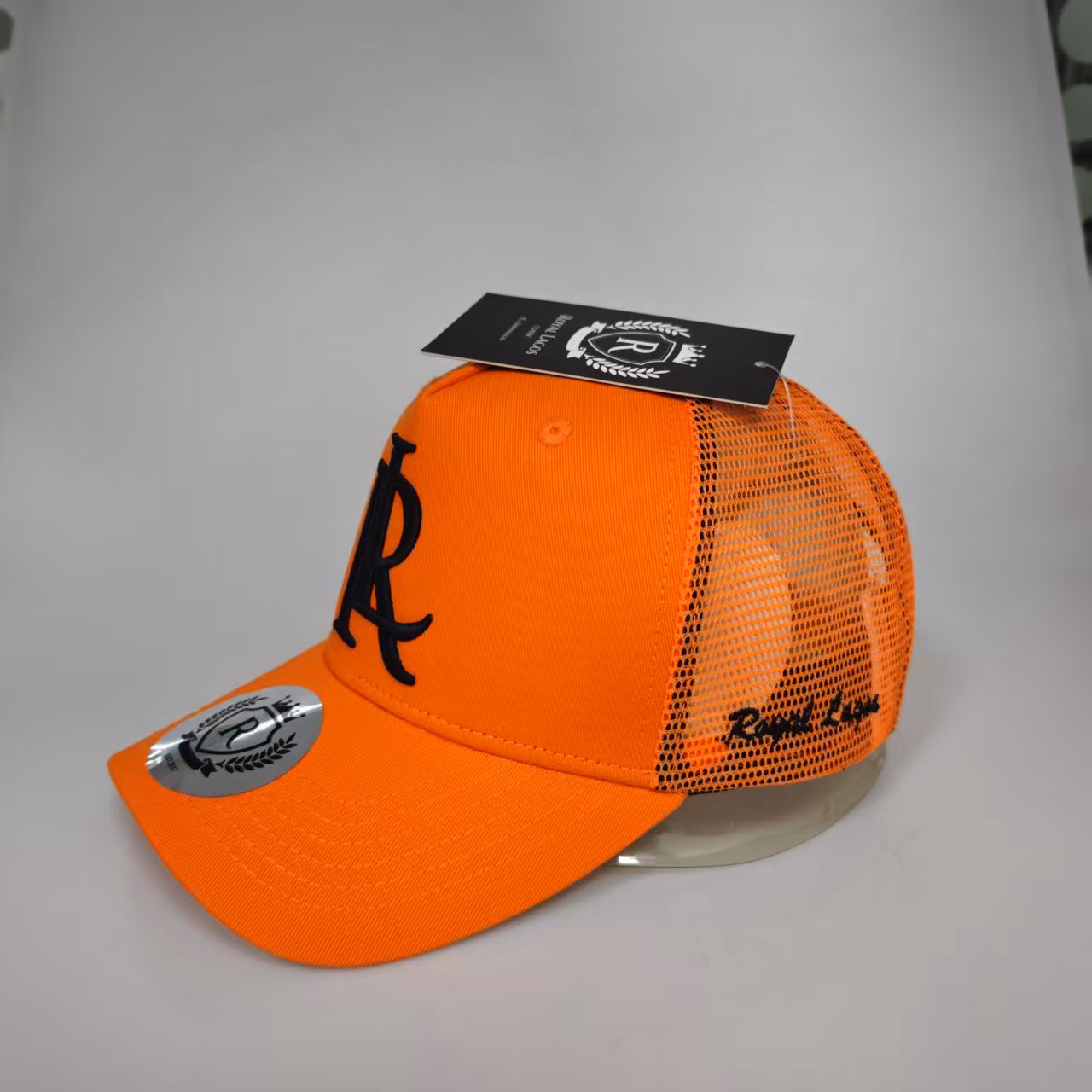 Royal Lagos Trucker Cap – Orange (Black R Monogram) - Image 2