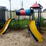 Outdoor Kids Playground Set with Twin Slides, Swings and Tunnel